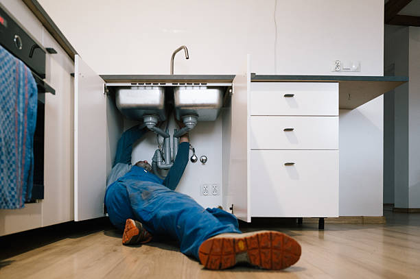 Professional Plumbing technician working in Intercession City, FL
